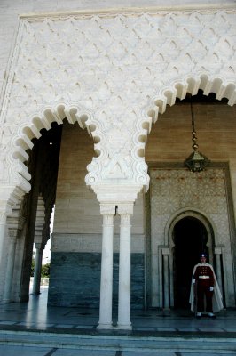 the cool marble Mausoleum, where the present king's grandfather and father are both laid to rest