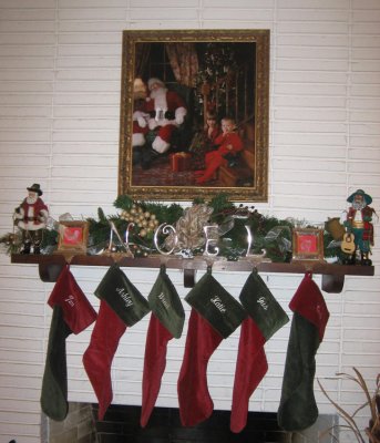 Mantle (need to get real greenery) with Katie & Gus with Santa Claus, my favorite picture