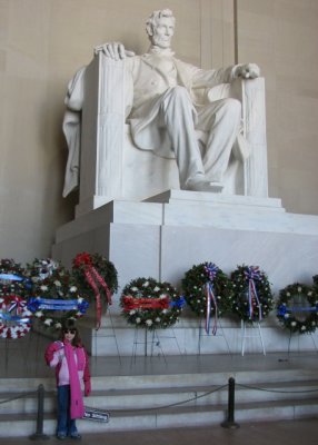 Kate with her President's Day school project at the Lincoln Memorial