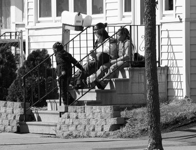 Sisters Sitting in the Sun on the Steps