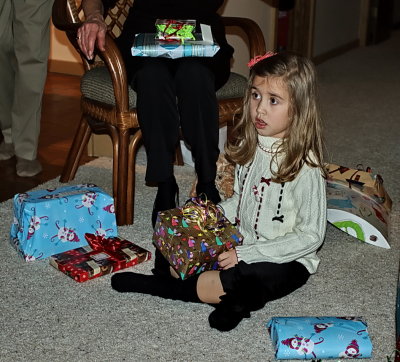 Stella waiting so Patiently to open a present