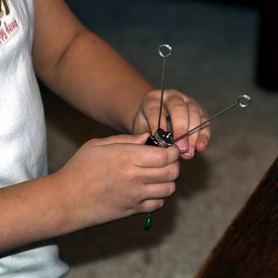 Stella winding a picture frame