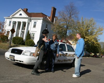 Police confrontation -  kicked tires