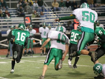 Evan Tripicco runs a quarterback keeper