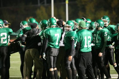 Coach Vessio rallies the defense during a time out