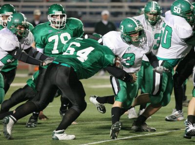 Lee Rogers tackles Greene's Zach Whittaker and...