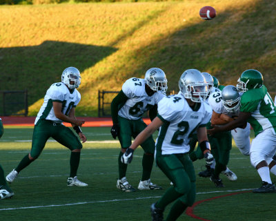 Newfield's QB Mike Armstrong gets off a pass