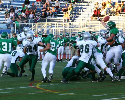 Seton's Chris Furner deflects the Newfield extra point attempt