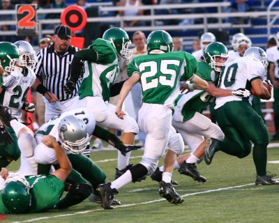 Seton's Chris Fitzpatrick tackling the Newfield QB Mike Armstrong