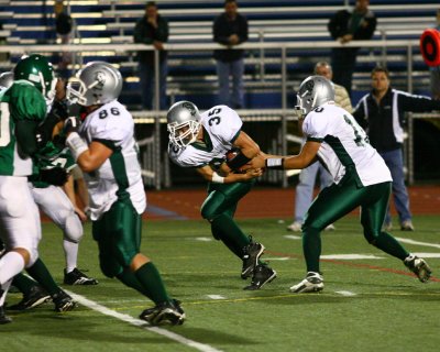 QB Mike Armstrong handing off to Josh Wager for Newfield
