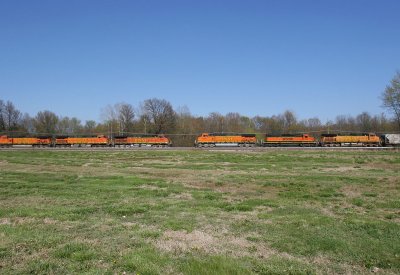 Two triple headed BNSF trains meet at Sullivan on CSX tracks.