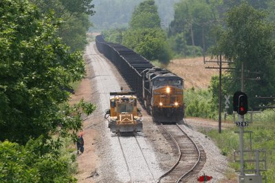 An empty coal train waits in the siding at Belknap for the arrival of MVL 125 out of Evansville.