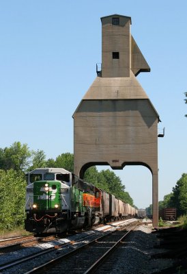 A beautiful SD60 pulls a CSX grain train south through the old CE&I coal chute north of Sullivan.