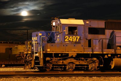 A NB rock train under a full moon at Howell.