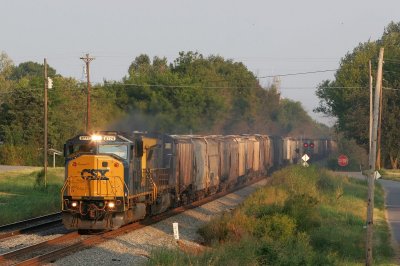 A NB grain train catches the last bit of evening sun just south of Hopkinsville KY