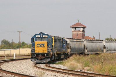The deteriorating L&N depot visible above a dormant Henderson - Evansville local.