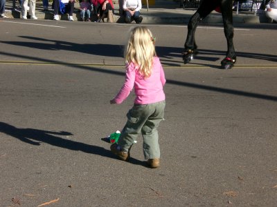 Hold on to your kids! He lures them in by tossing out toys