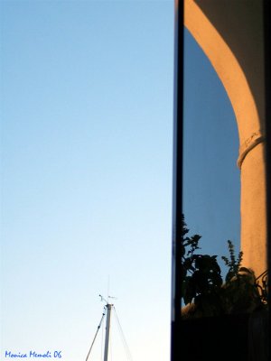 Arch reflection in sunset light