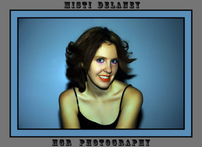 HGRP Model Misti Delaney Head Shot blue background.jpg