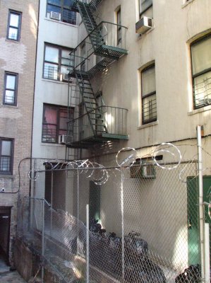 The back of grandma's building on Walton. Her fire escape where I used to talk to Robby . COPYRIGHT PAT MORGAN 2007