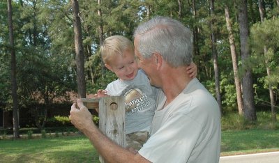 Brooks checks on his baby birds
