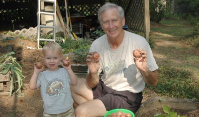 Brooks and PaPa with their potatoes