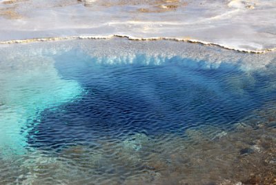 Clear water of a hot spring at Geysir