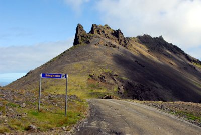 Sönghellir, the Song Cave, and mountain road 570 which climbs Snæfellsnesjökull