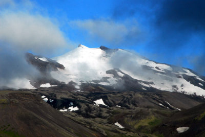 Snæfellsjökull peaking through the clouds at the end of Snæfellsnes Peninsula