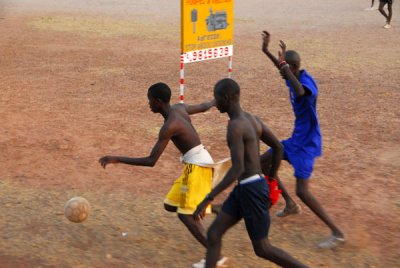 Soccer game along the roadside, Tambacounda