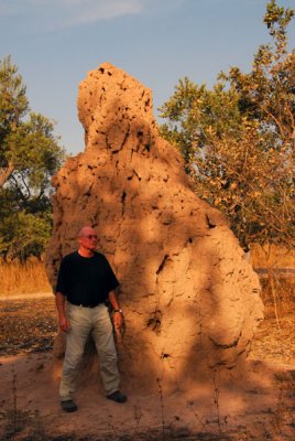Hubertus with a termite mound