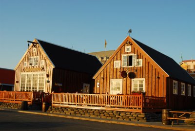 Skipasmídastödin, an old timber house by the harbor with the Gamli Baukur Restaurant
