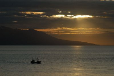 Ship headed for port at sunset, Hsavk