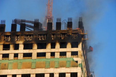 The fire was limited to the top 3 floors of the building