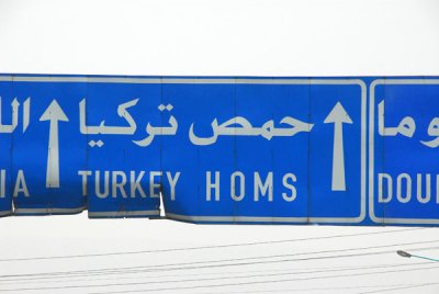 Lots of overhead signs on the Syrian roads have been hit by oversized vehicles