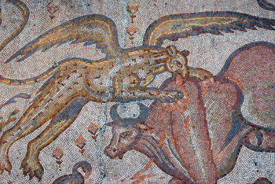 Mosaic - mythological griffin hunting a bull