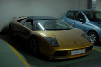 Beat up Lamborghini in the garage of the Grosvenor House