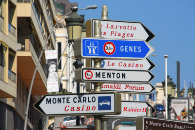 Road signs in Monaco for Monte Carlo Casino, Menton and Genoa