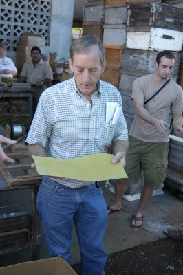 Tom McCormack holds a sheet of foundation