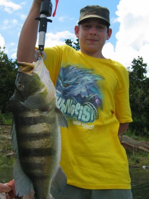 Garrick McAlhany with a 11 pound Peacock Bass caught in Brazil