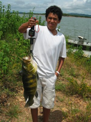 Dave McAlhany with a 8 pound Bass caught in Brazil