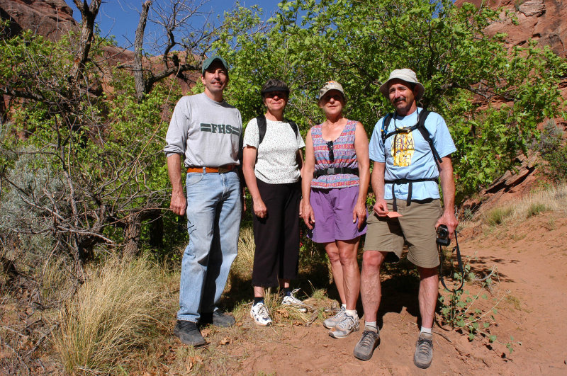 Hikers near Morning Glory Natural Bridge