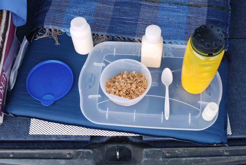Breakfast is served: Grape Nuts Flakes cereal , orange juice, vitamin tablet