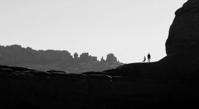 Silhouettes at the end of the Delicate Arch Trail