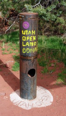 Donation box for Utah Open Lands at the trailhead for Castleton Tower