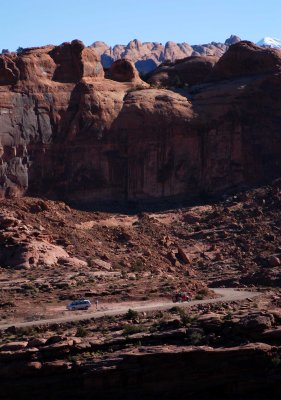 Fins above van and Jeep on Kane Creek Road