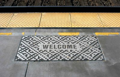 Welcome mat on the platform