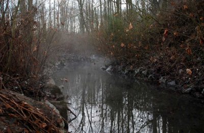 Fog above a fish inlet connected to the Cedar River