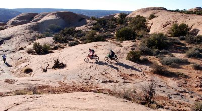 Bikers on rock (the leader is at far left)