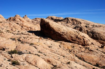 Shadowy cliff is about 50 feet (15m) tall